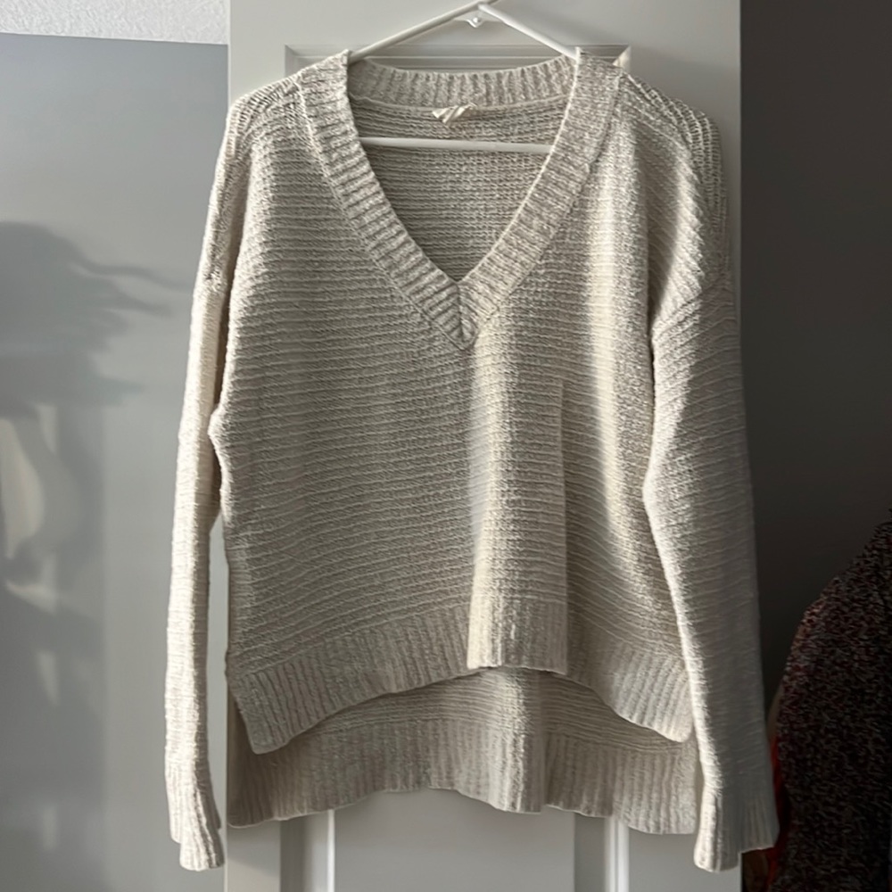 White knit v neck sweater